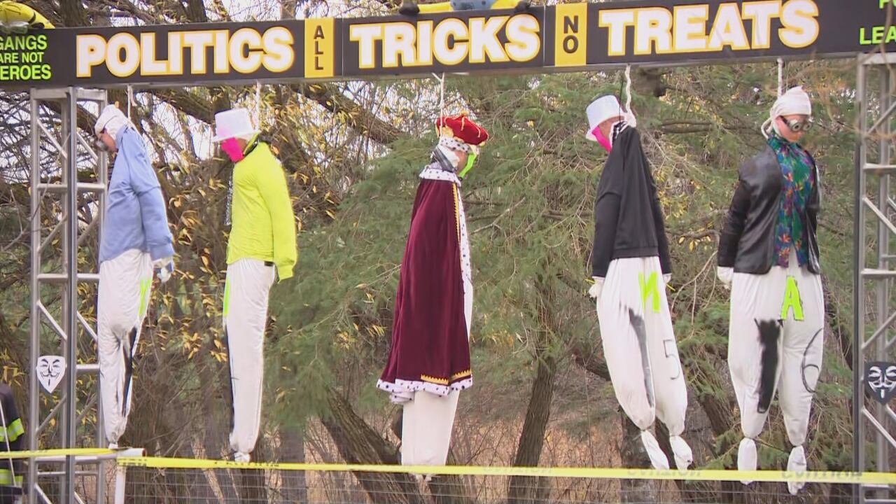 default-18 Dolls hanging from nooses in a homemade gallows